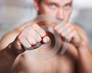 Boxing, hands and portrait of man on blurred background with fitness, power and training challenge. Strong body, muscle