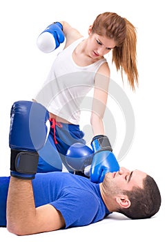Boxing knockout. Girl knocked out man photo