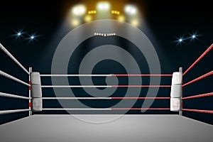 Boxing ring with illumination by spotlights