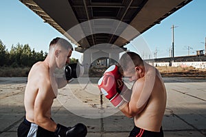 Boxing sparring. two boxers fighting in boxing gloves