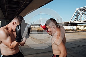 Boxing sparring. two boxers fighting in boxing gloves