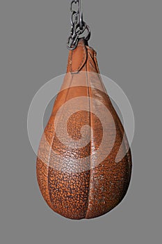 Boxing speed bag, pear shaped, old yellow leather, weathered and worn