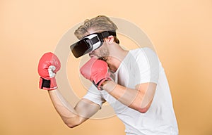 Boxing in virtual reality. Digital sport success. man in VR glasses. Futuristic gaming. vr boxing. future innovation