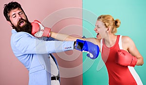 Boxing workout. bearded man hipster fighting with woman. problems in relationship. sport. Strength and power. knockout