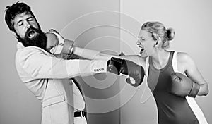 Boxing workout. bearded man hipster fighting with woman. problems in relationship. sport. Strength and power. knockout