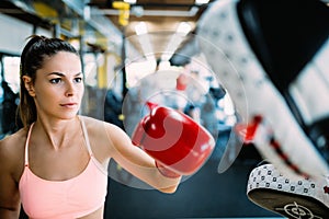 Boxing workout woman in fitness class ring