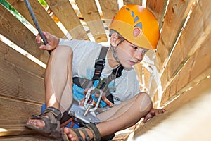 Boy in an adventure park