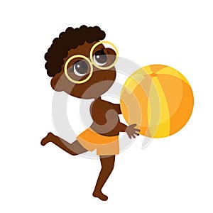 Boy African or African American in summer beach shorts and glasses take the ball in his hands.