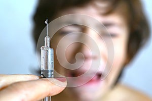 Boy aftaid of vaccination injection