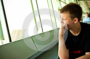 Boy in airport lounge