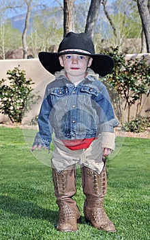 Boy in alligator boots