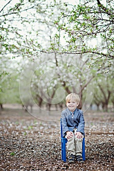 Boy and almond blossom