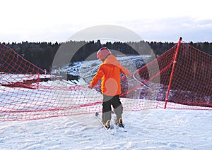 A boy in Alpine skiing