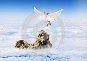 Boy with Angel Wings flying around in the sky