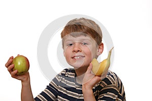 Boy with apple and banana