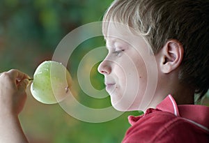 Boy with a apple