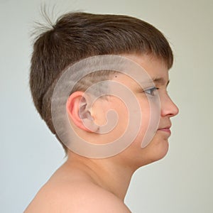 Boy with asymmetrical haircut photo