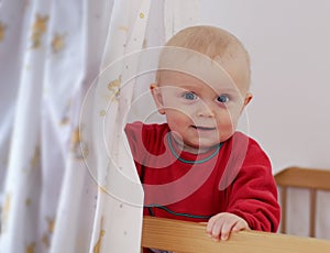 Boy in Baby Bed