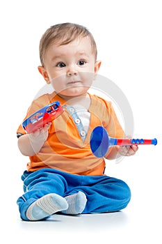 Boy baby with musical toys