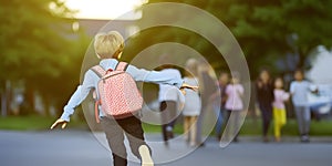 Boy with backpack going to school. Concept of back to school.. AI generated