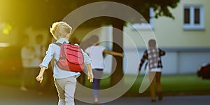 Boy with backpack going to school. Concept of back to school.. AI generated