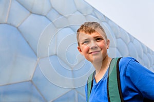 Boy with the backpack in the Olympic Park in Beijing