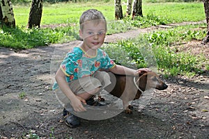 Boy with badgerdog