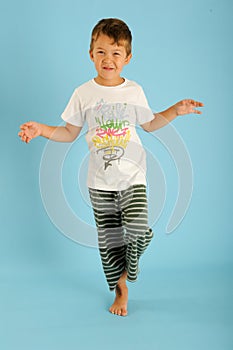 Boy in balance on one foot