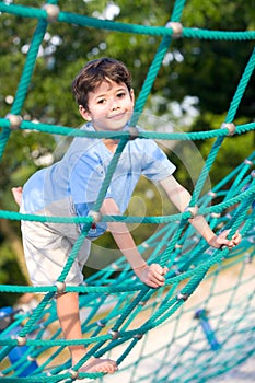 boy balancing on rope activity