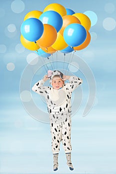 The boy and balloons