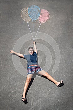 Boy and balloons