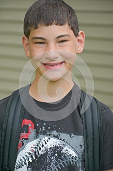 Boy with Baseball Shirt and Backpack