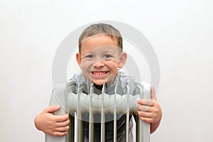 Boy bask near the oil cooler