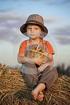 Boy with basket of buns