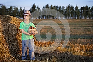 Boy with basket of buns