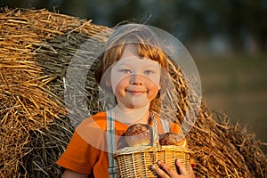 Boy with basket of buns