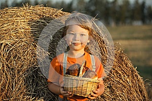 Boy with basket of buns i