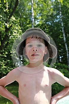 Boy in bath hat