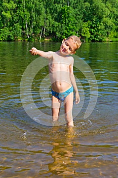 Boy bathes