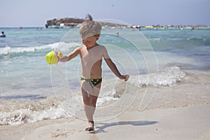 Boy on the beach in Ayia Napa photo