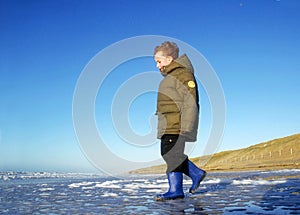 Boy at Beach in Winter
