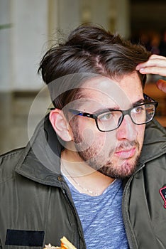 Boy with beard and brown eyes