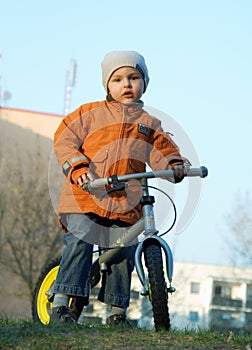 The boy and a bicycle