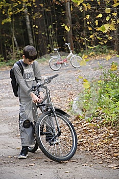 Boy on the bike photo