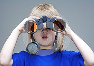 Boy with binaculars