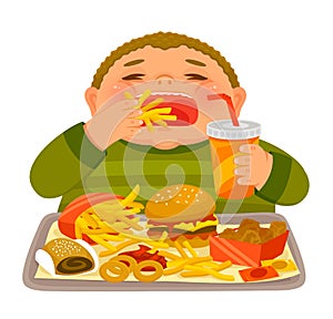 Boy binge eating junk food