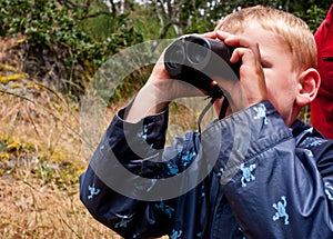 Boy with binoculars