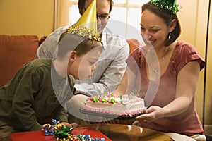 Boy with birthday cake.