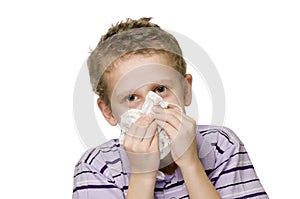 Boy blow nose two hands