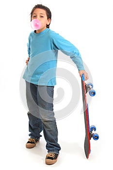 Boy blowing a bubble gum holding a skate